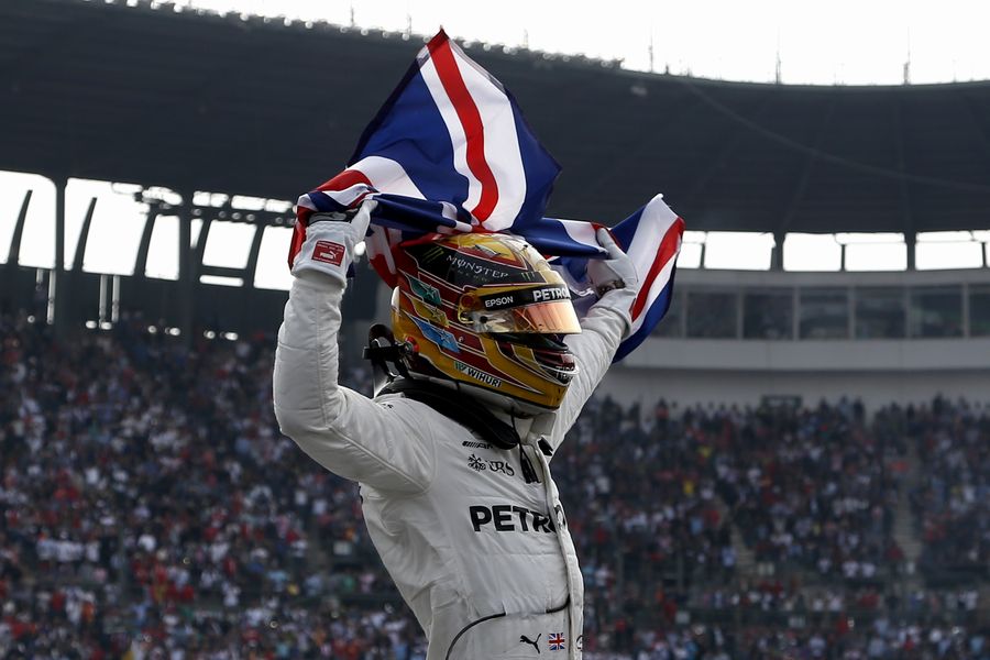World Champion Lewis Hamilton celebrate