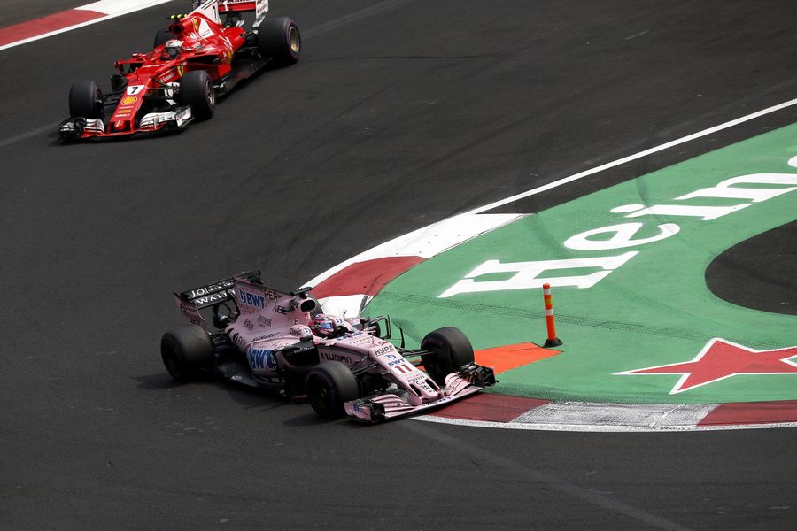 Sergio Perez and Kimi Raikkonen battle for position