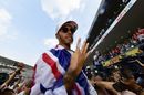 World Champion Lewis Hamilton celebrates with the team