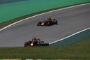Daniel Ricciardo and Max Verstappen on track in the Red Bull
