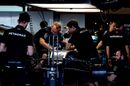 Mercedes mechanics work on the chassis