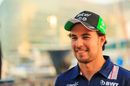 Sergio Perez looks relaxed in the paddock