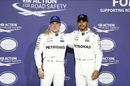 Pole sitter Valtteri Bottas and Lewis Hamilton in parc ferme