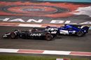 Kevin Magnussen and Pascal Wehrlein battle for position