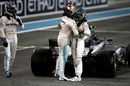 Lewis Hamilton congratulates and celebrates in parc ferme with Felipe Massa and race winner Valtteri Bottas