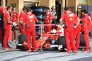 Sebastian Vettel returns to the pitbox