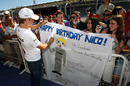 Nico Rosberg signs autographs for fans on his birthday