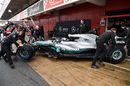 Mercedes mechanics wheel Valtteri Bottas back into the garage