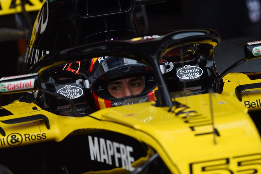 Carlos Sainz jr sits in the Renault cockpit