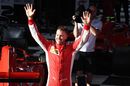 Race winner Sebastian Vettel cerebrates on the palc ferme