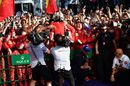 Sebastian Vettel cerebrates with Ferrari in parc ferme