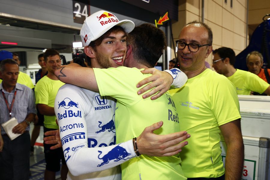 Pierre Gasly celebrates fourth place with the team