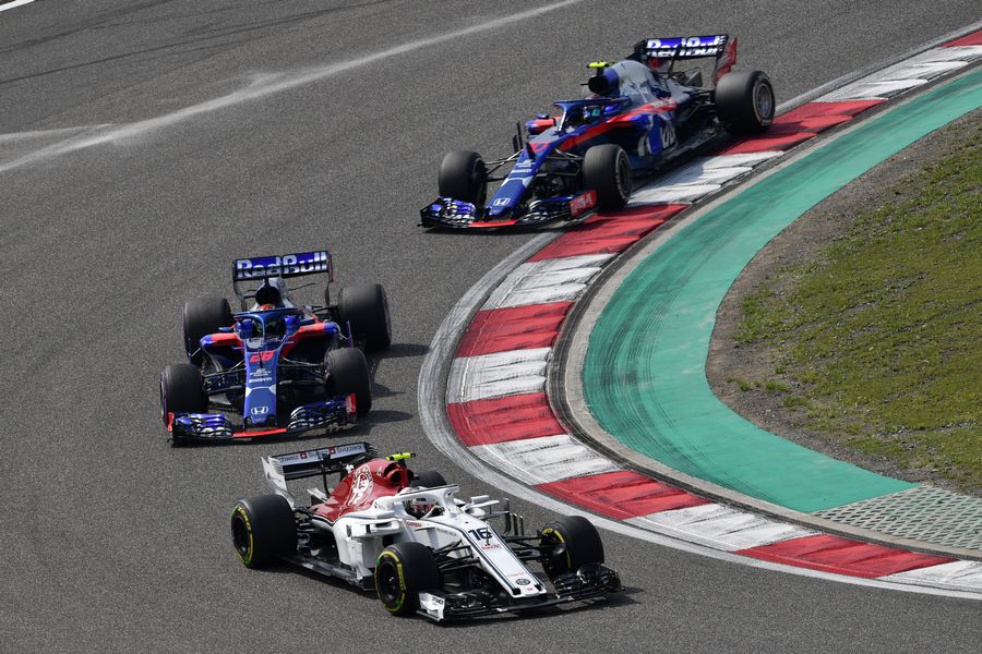 Charles Leclerc leads Brendon Hartley