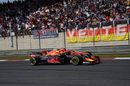 Daniel Ricciardo and Kimi Raikkonen battle