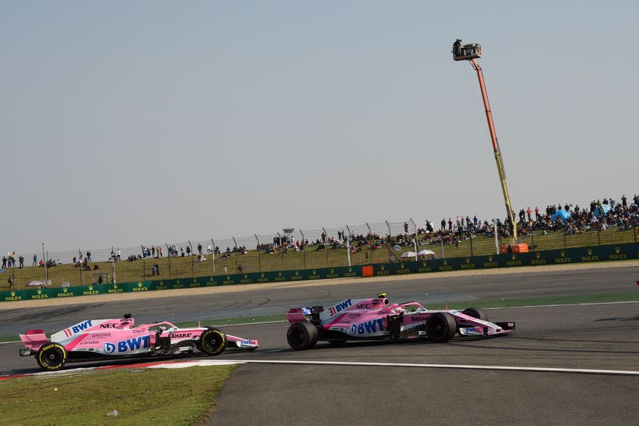 Esteban Ocon and Sergio Perez battle