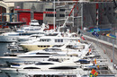 Felipe Massa speeds past boats in the harbour