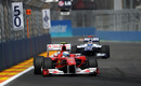 Fernando Alonso leads Rubens Barrichello