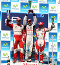 Pastor Maldonado (centre), Jules Bianchi (left) and Sam Bird (right) celebrate on the podium