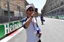 Pierre Gasly takes a photo on the track walk