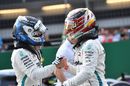 Valtteri Bottas and Lewis Hamilton celebrate in parc ferme