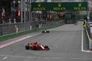 Sebastian Vettel leads Lewis Hamilton