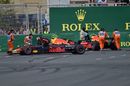 The crashed cars of Max Verstappen and Daniel Ricciardo