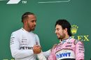 Lewis Hamilton and Sergio Perez celebrate on the podium