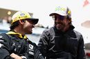 Fernando Alonso talks with Carlos Sainz on the drivers parad