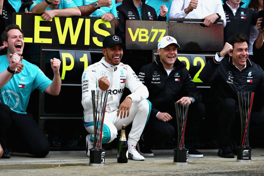 Race winner Lewis Hamilton, Valtteri Bottas and Toto Wolff at the team celebratrations