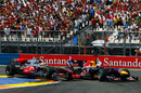 Lewis Hamilton rides the kerb in challenging Sebastian Vettel