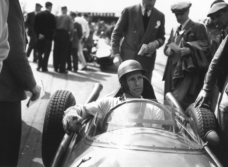 Peter Collins at the wheel before a race at Silverstone