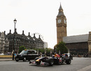 Mark Webber rounds Parliament Square