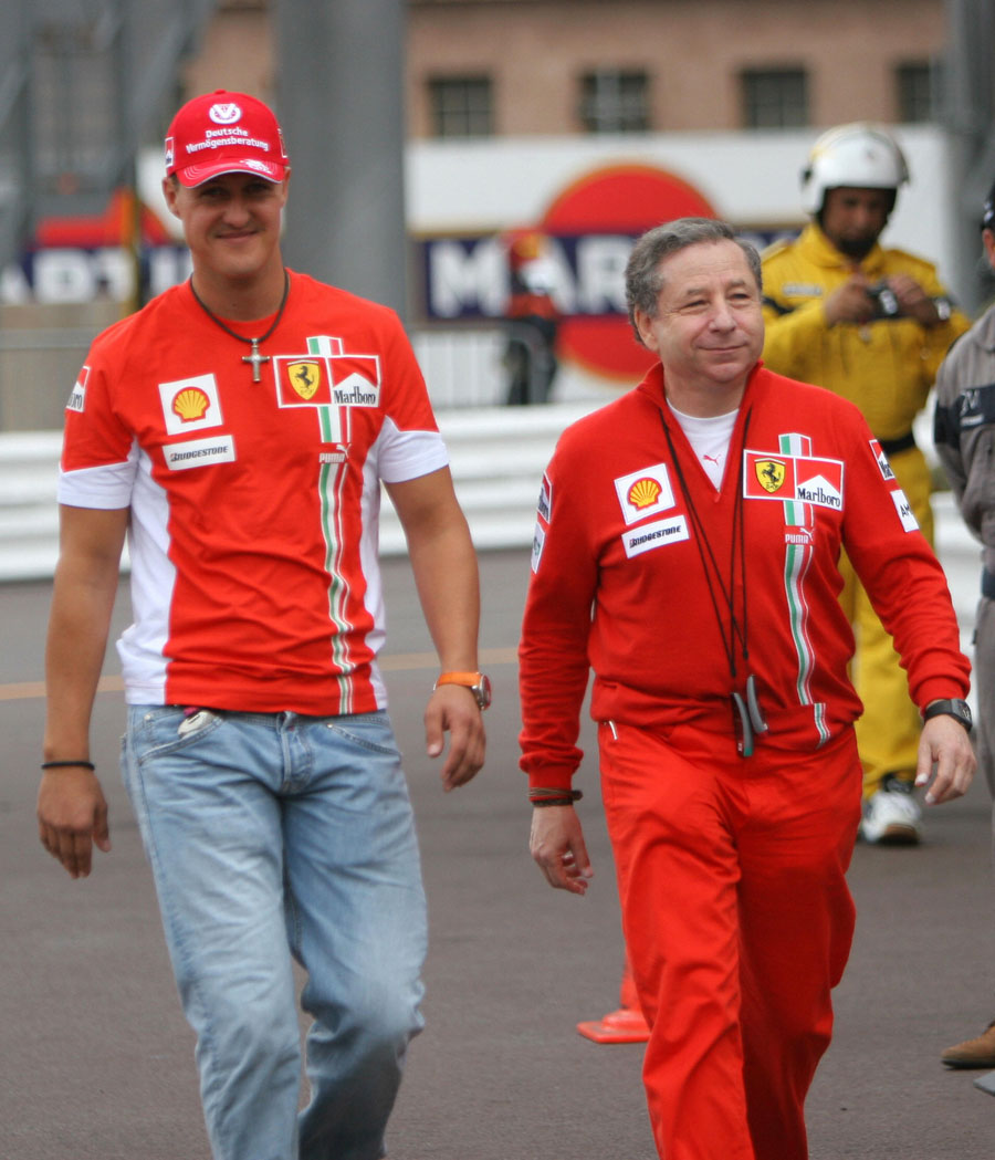 Michael Schumacher and Jean Todt in the paddock