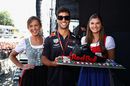 Daniel Ricciardo is presented with a birthday cake to celebrate his 29th birthday