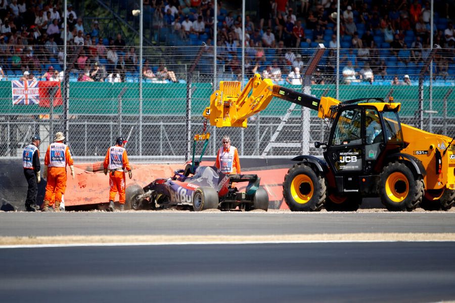 Brendon Hartley's car is removed from the track after crashing out
