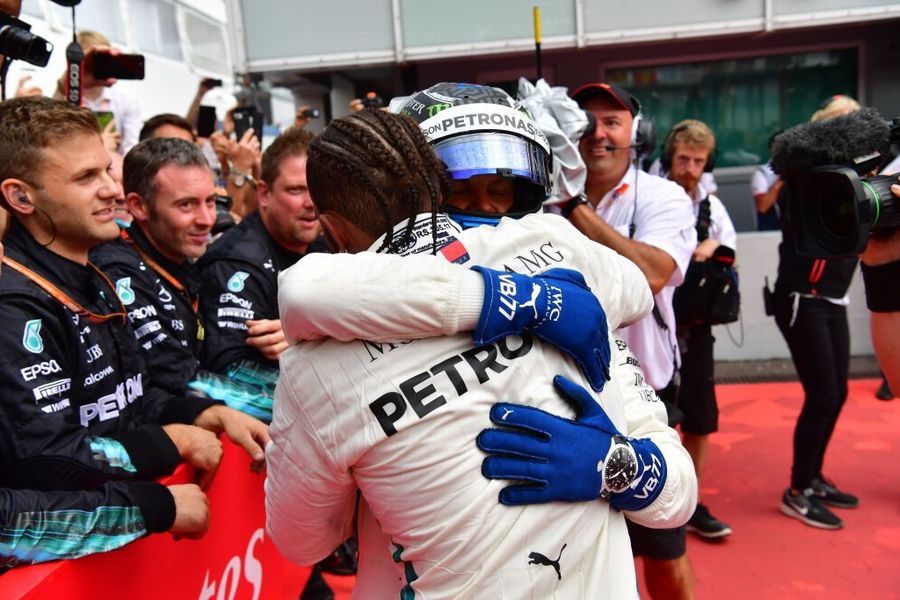 Race winner Lewis Hamilton and Valtteri Bottas celebrate in parc ferme