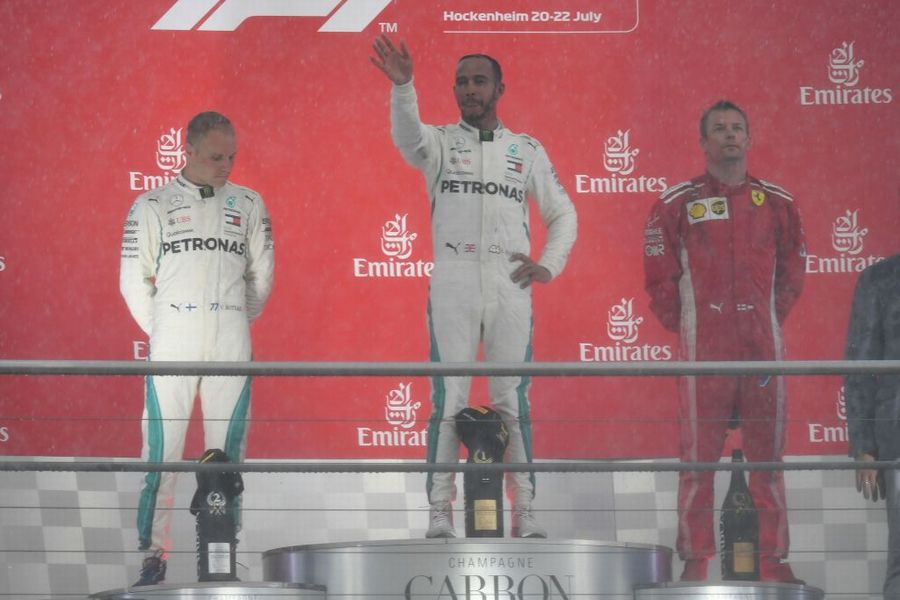 Top 3 drivers celebrate on the podium