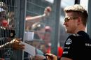 Nico Hulkenberg signs autographs for fans