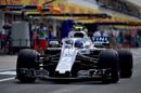 Sergey Sirotkin powers down the pit lane in the Williams