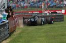 Valtteri Bottas drives over the lawn after slipping off the racetrack