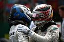 Pole sitter Lewis Hamilton and Valtteri Bottas celebrates in parc ferme
