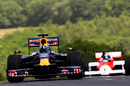 Mark Webber drives the Red Bull Racing RB1 Demo Car up the Goodwood hill