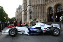 A Sauber sits outside London's Natural History Museum ahead of the Great Ormond Street Grand Prix Party