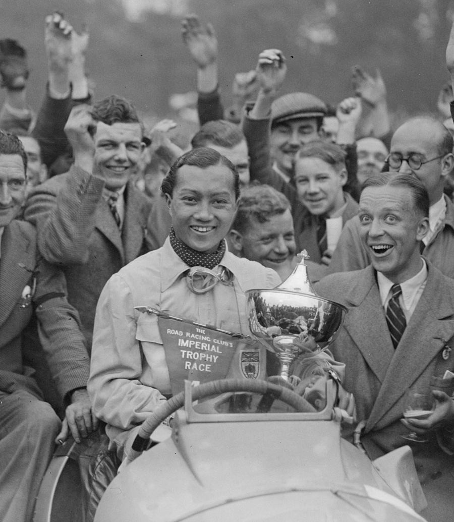 Prince Bira in jubilant mood after winning the Road Racing Club's Imperial Trophy Race at Crystal Palace.