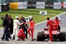 Pole position qualifier Lewis Hamilton shakes hands with Sebastian Vettel