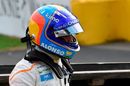 Fernando Alonso is pictured after a crash