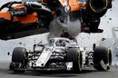 Fernando Alonso crashes ontop of Charles Leclerc