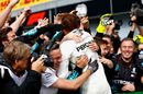 Race winner Lewis Hamilton cerebrates with Mercedes in parc ferme