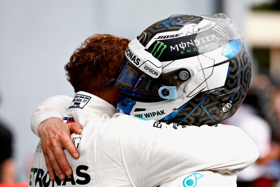Race winner Lewis Hamilton and Valtteri Bottas celebrates in parc ferme