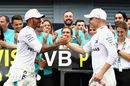 Race winner Lewis Hamilton celebrates with Valtteri Bottas